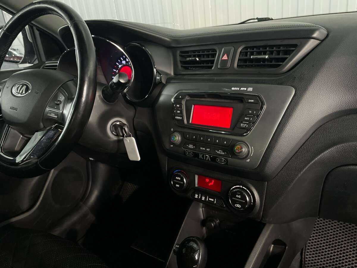 Kia Rio с пробегом — 2014 год. Фото: #12