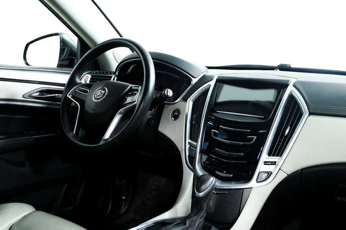 Cadillac SRX с пробегом — 2014 год. Фото: #8