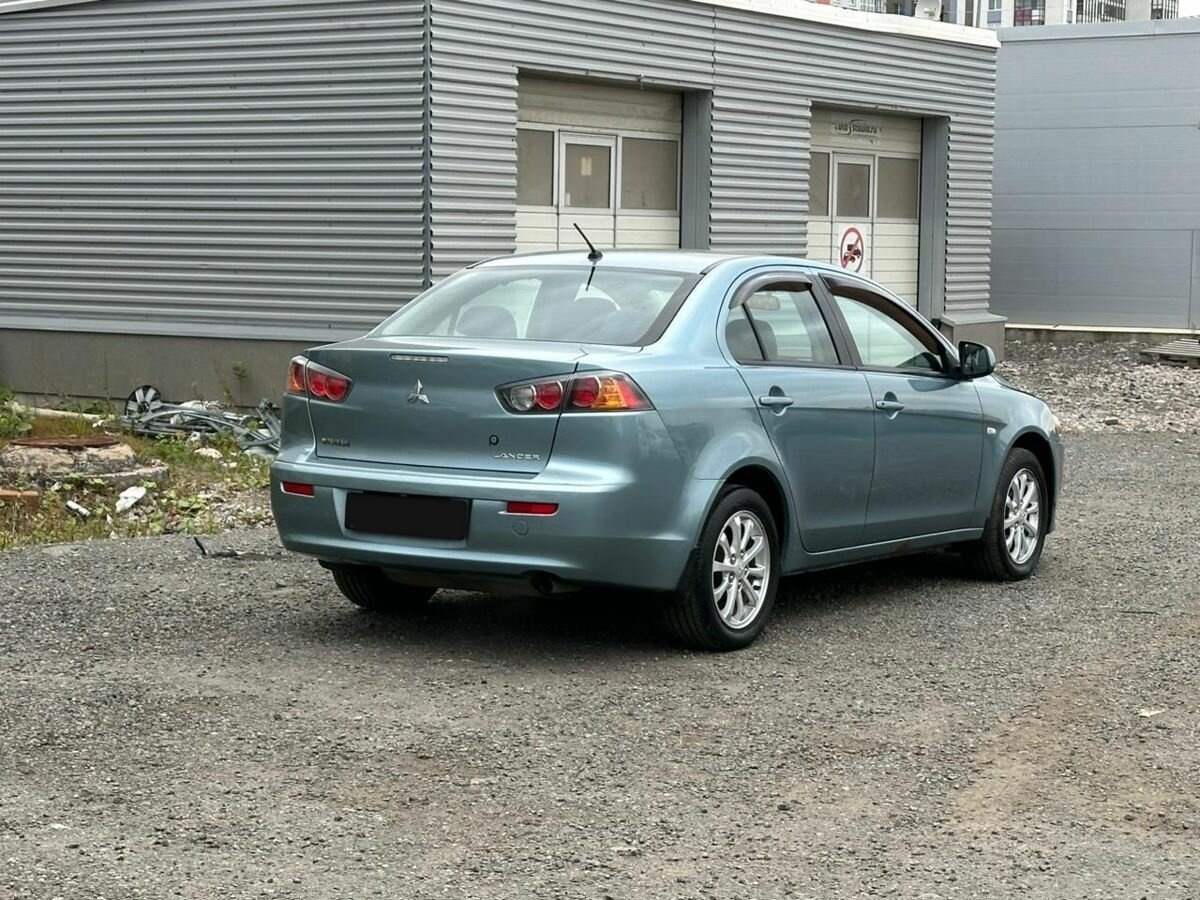 Mitsubishi Lancer с пробегом — 2011 год. Фото: #2