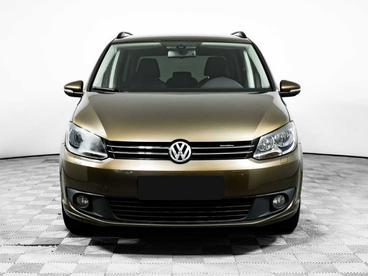 Volkswagen Touran с пробегом — 2013 год. Фото: #1