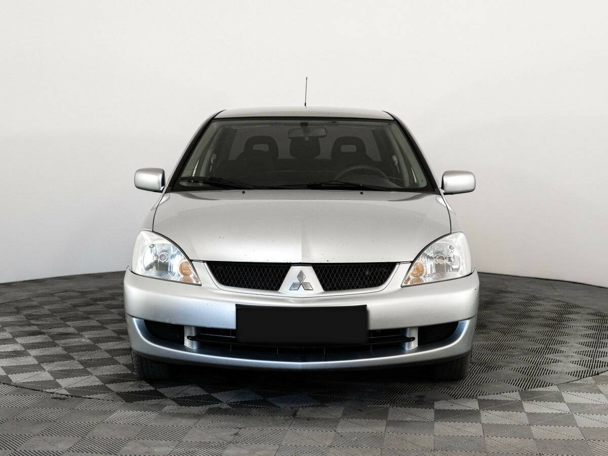 Mitsubishi Lancer с пробегом — 2006 год. Фото: #1