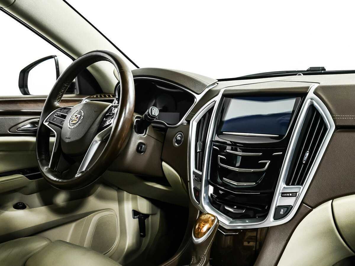 Cadillac SRX с пробегом — 2013 год. Фото: #8