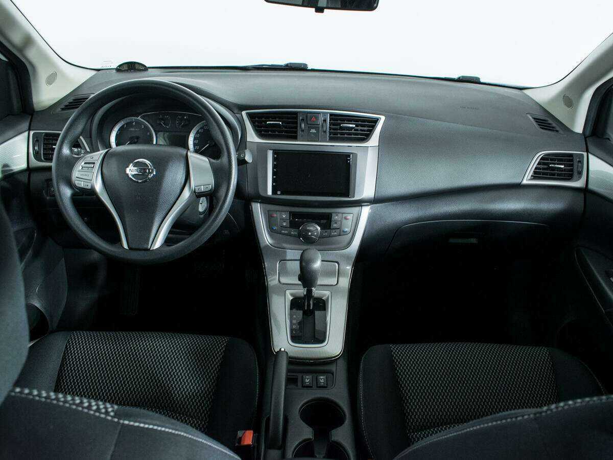 Nissan Tiida с пробегом — 2015 год. Фото: #11