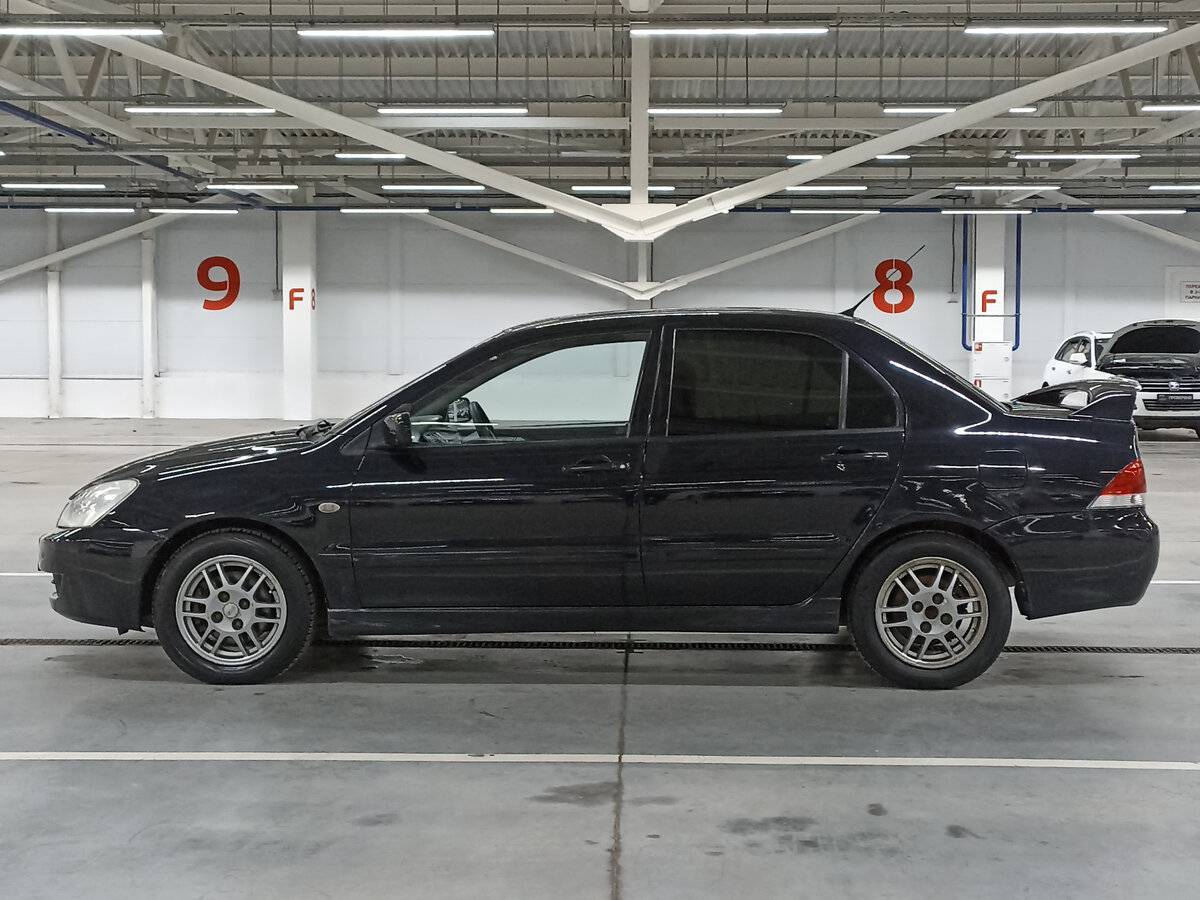 Mitsubishi Lancer с пробегом — 2006 год. Фото: #7