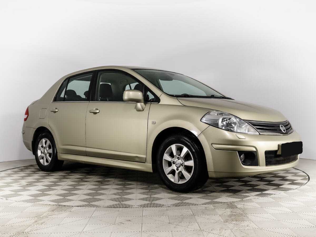 Nissan Tiida с пробегом — 2011 год. Фото: #2