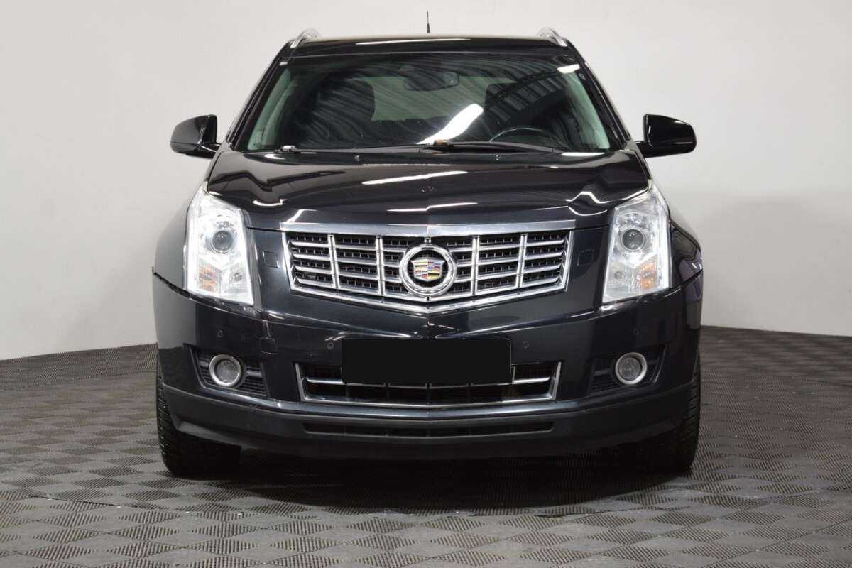 Cadillac SRX с пробегом — 2013 год. Фото: #1