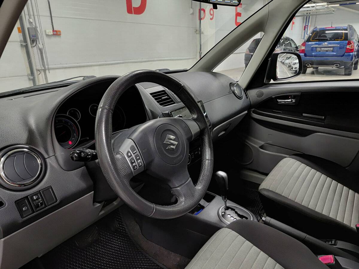Suzuki SX4 с пробегом — 2011 год. Фото: #15