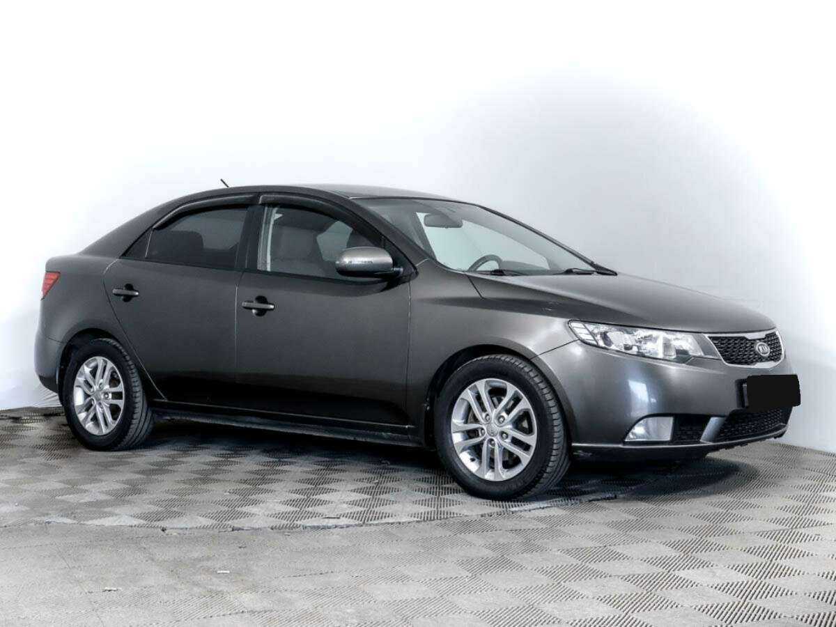 Kia Cerato с пробегом — 2010 год. Фото: #2