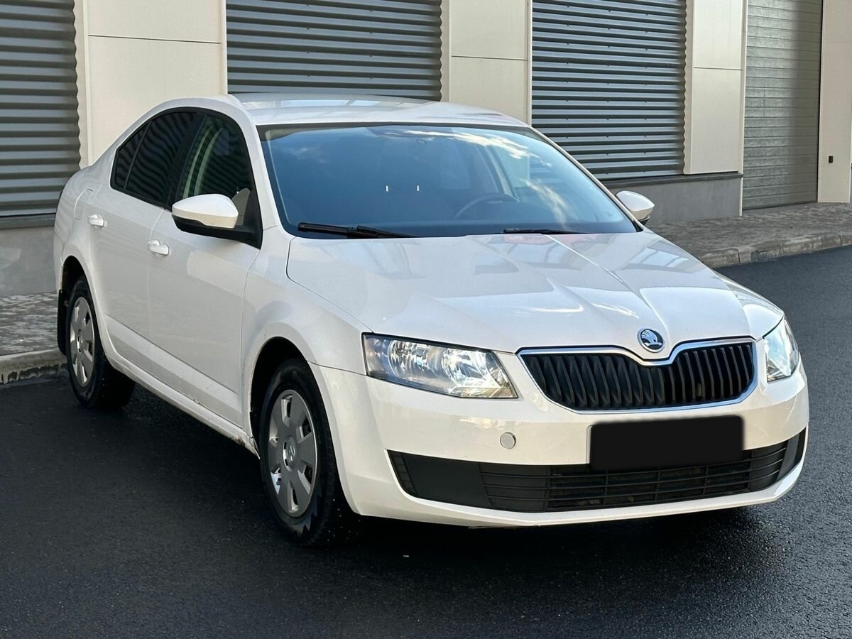 Skoda Octavia с пробегом — 2014 год. Фото: #1