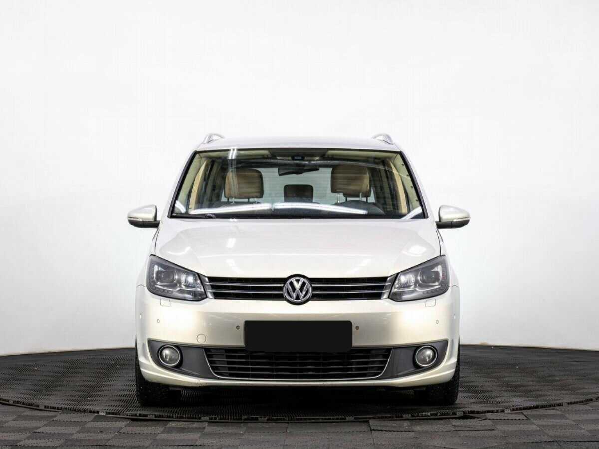 Volkswagen Touran с пробегом — 2013 год. Фото: #1