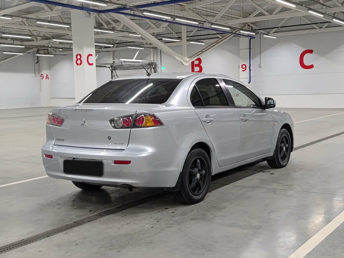 Mitsubishi Lancer с пробегом — 2011 год. Фото: #4