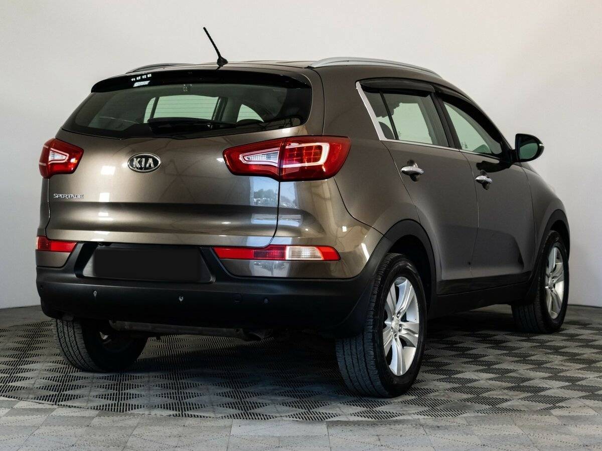 Kia Sportage с пробегом — 2010 год. Фото: #3
