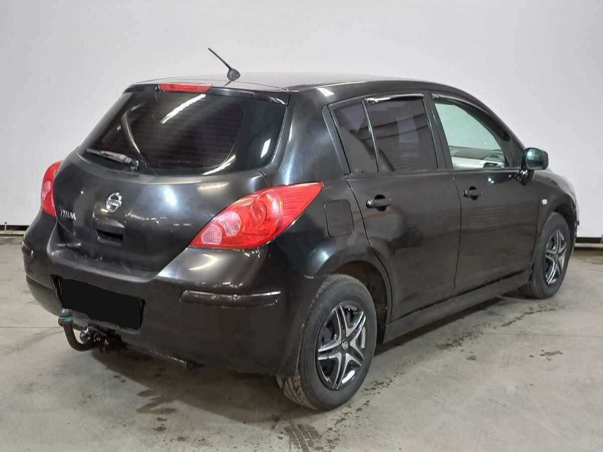 Nissan Tiida с пробегом — 2011 год. Фото: #4
