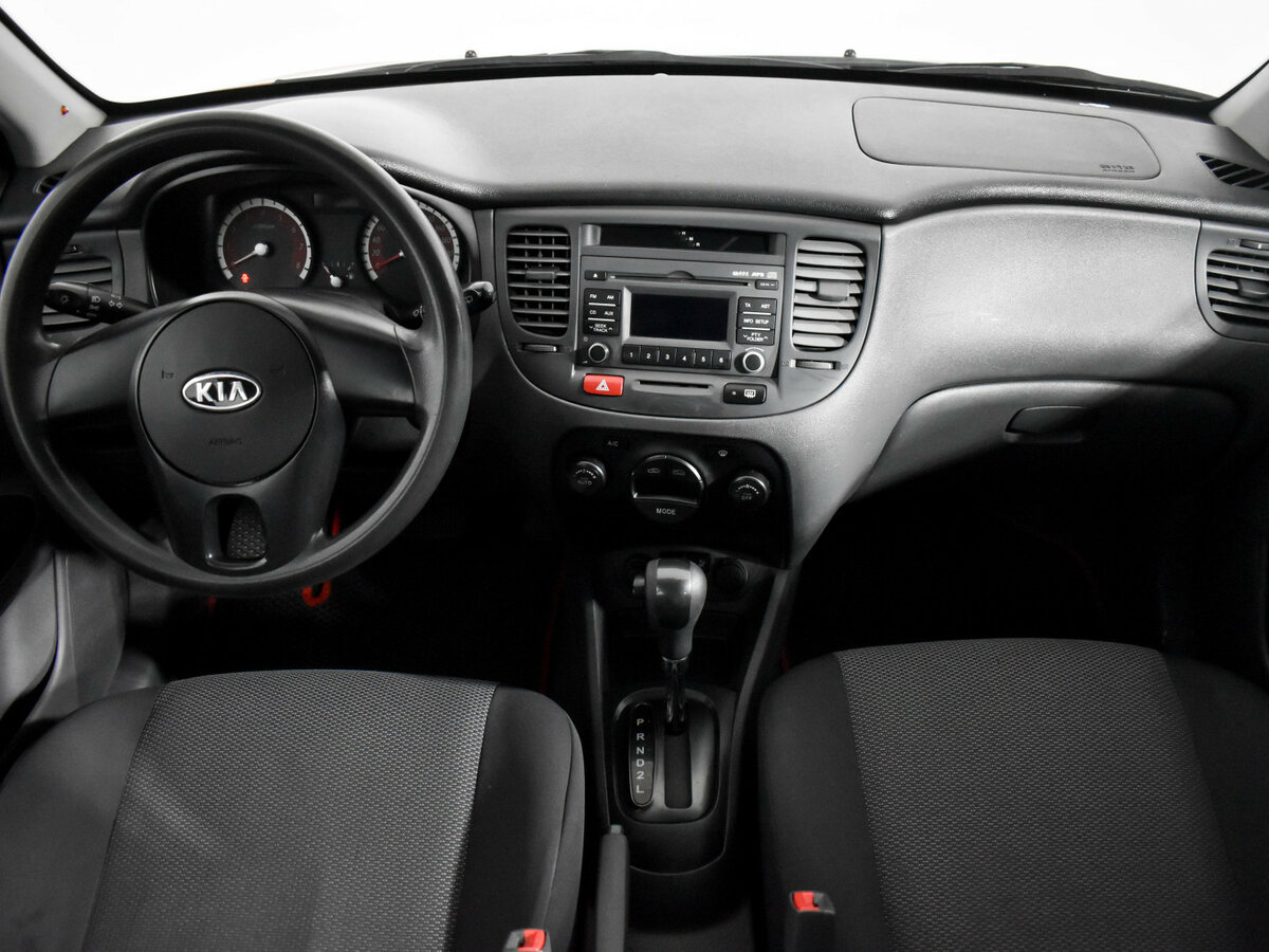 Kia Rio с пробегом — 2011 год. Фото: #11