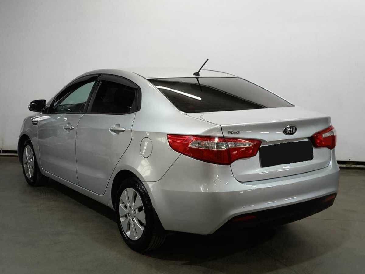 Kia Rio с пробегом — 2013 год. Фото: #6