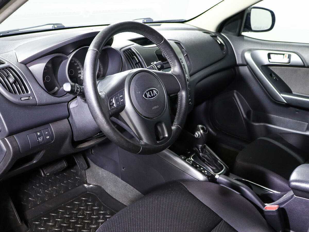 Kia Cerato с пробегом — 2011 год. Фото: #13