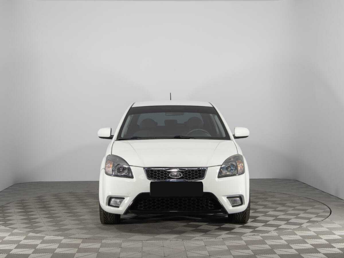 Kia Rio с пробегом — 2011 год. Фото: #1
