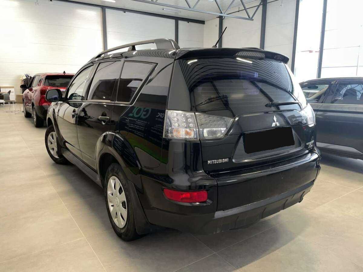 Mitsubishi Outlander с пробегом — 2011 год. Фото: #1