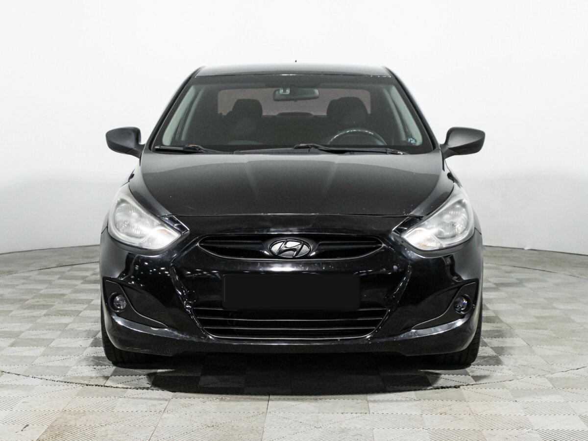 Hyundai Solaris с пробегом — 2011 год. Фото: #1