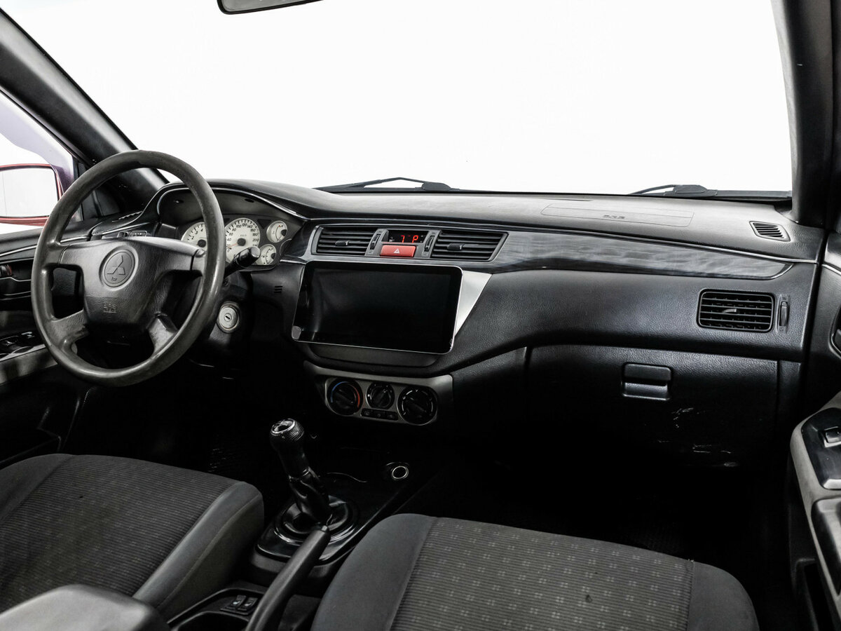 Mitsubishi Lancer с пробегом — 2005 год. Фото: #6