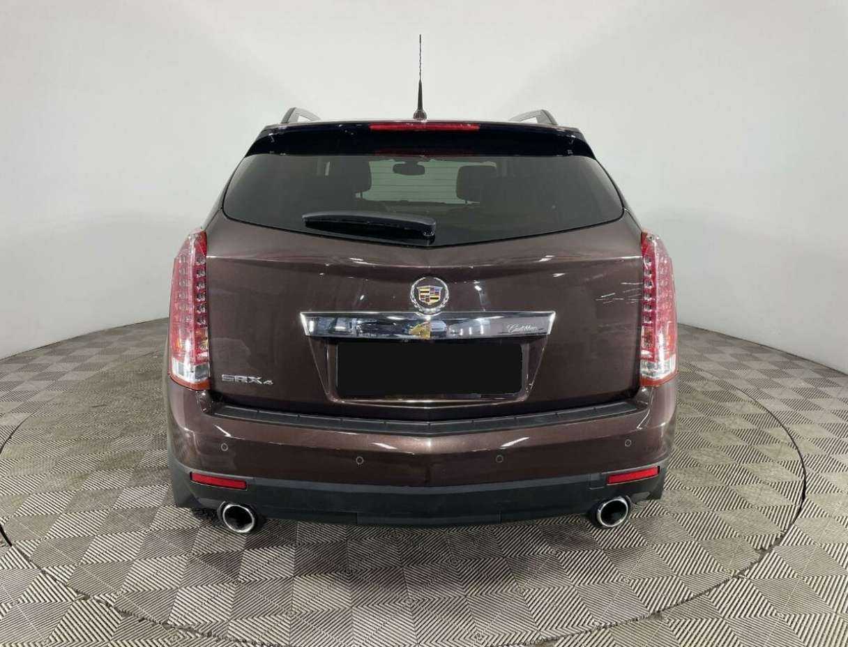 Cadillac SRX с пробегом — 2014 год. Фото: #2