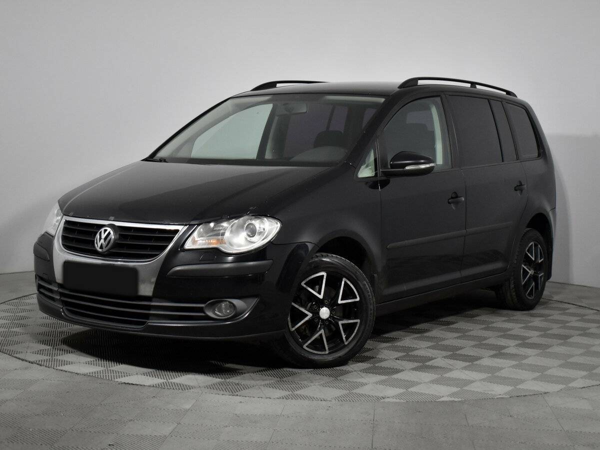 Volkswagen Touran с пробегом — 2010 год. Посмотреть фото
