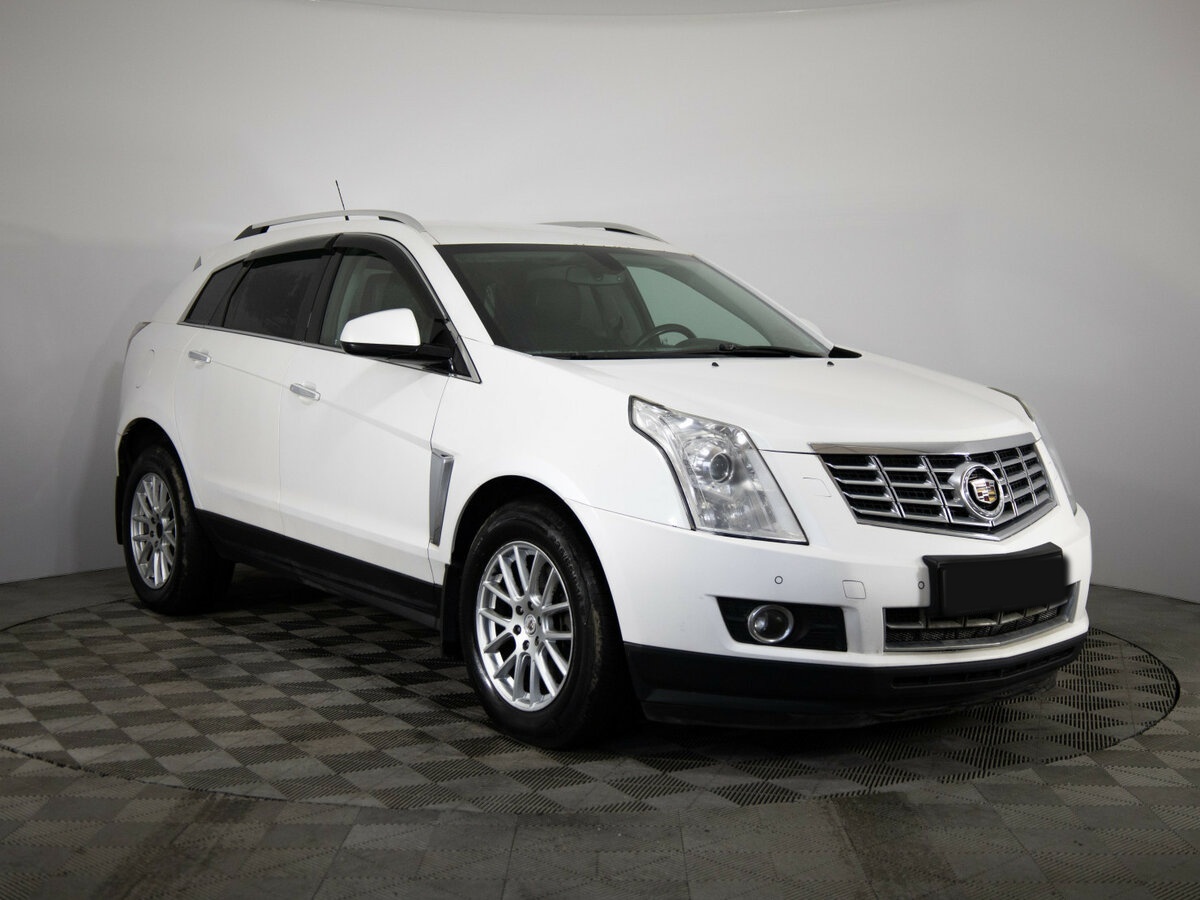Cadillac SRX с пробегом — 2013 год. Фото: #2