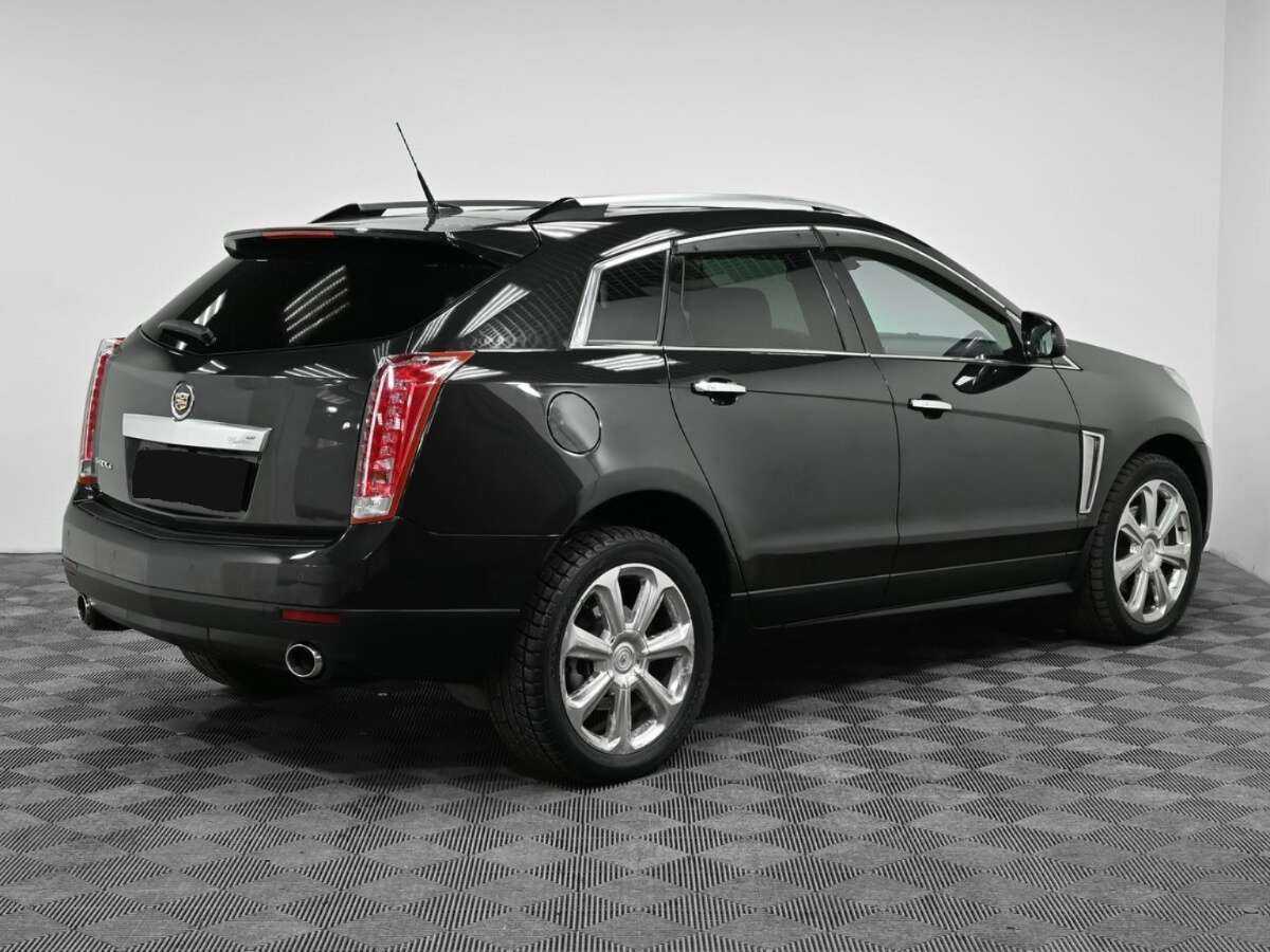 Cadillac SRX с пробегом — 2013 год. Фото: #1