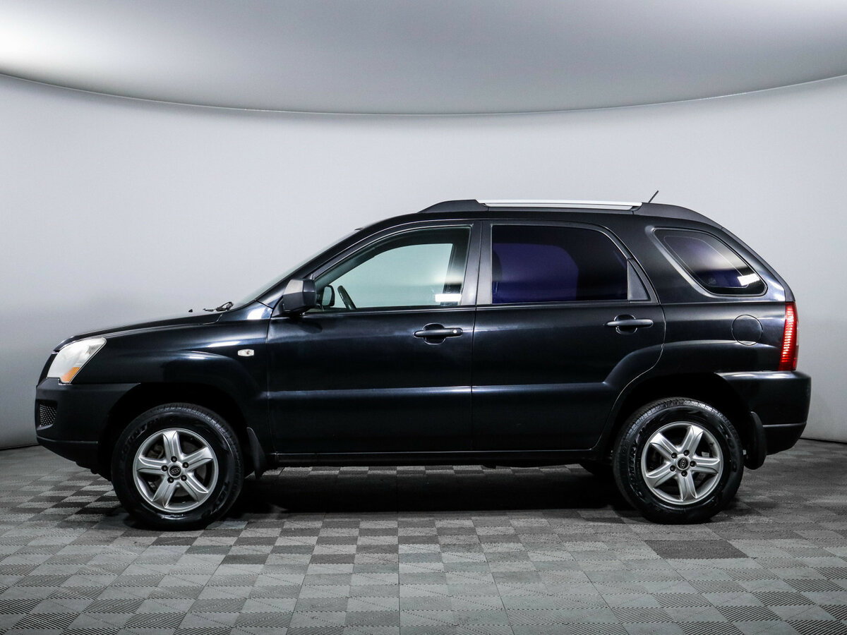 Kia Sportage с пробегом — 2009 год. Фото: #7