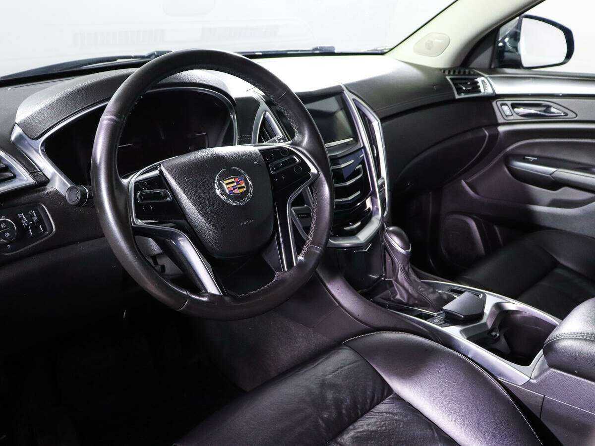 Cadillac SRX с пробегом — 2015 год. Фото: #11