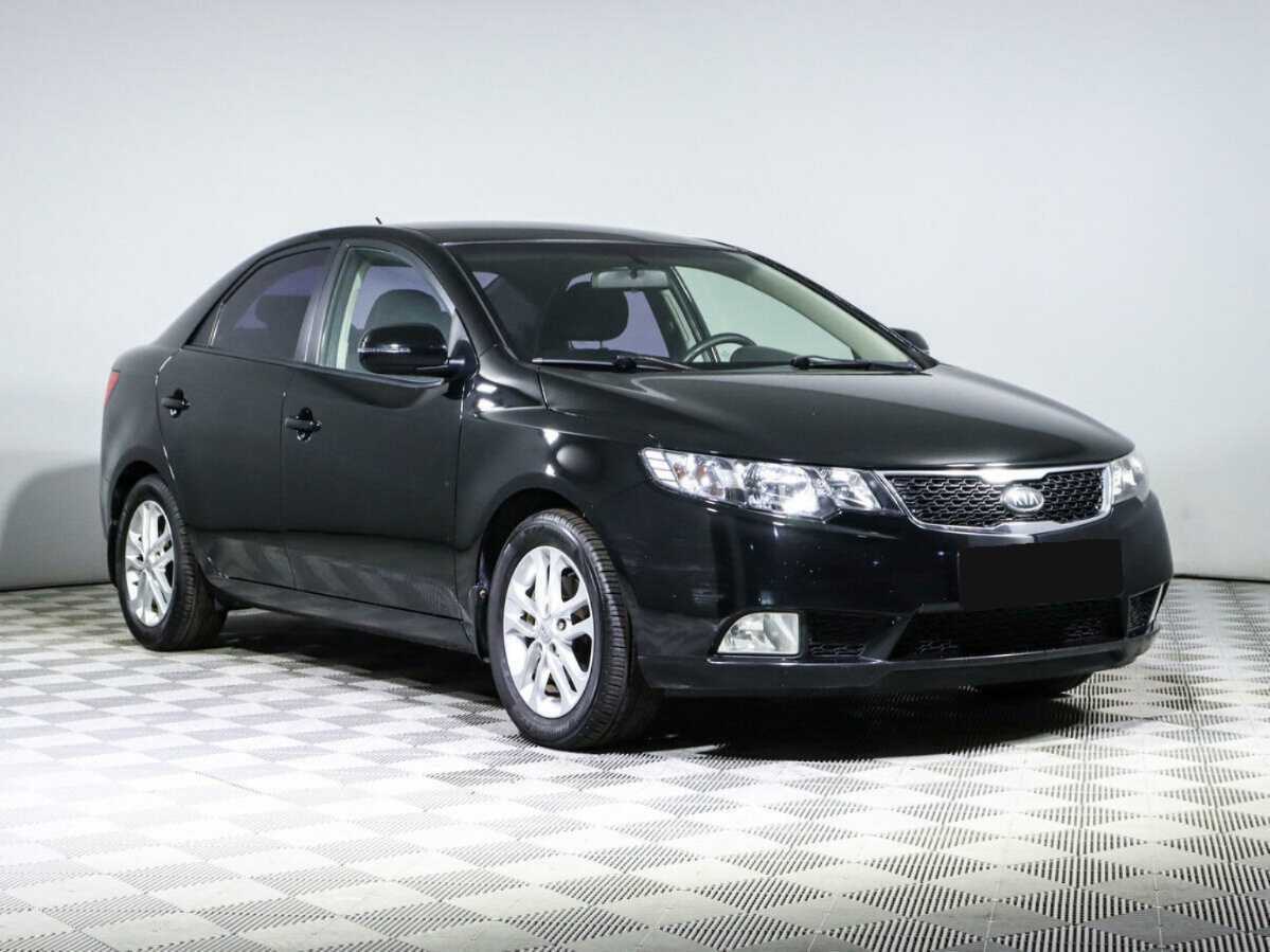 Kia Cerato с пробегом — 2011 год. Фото: #2