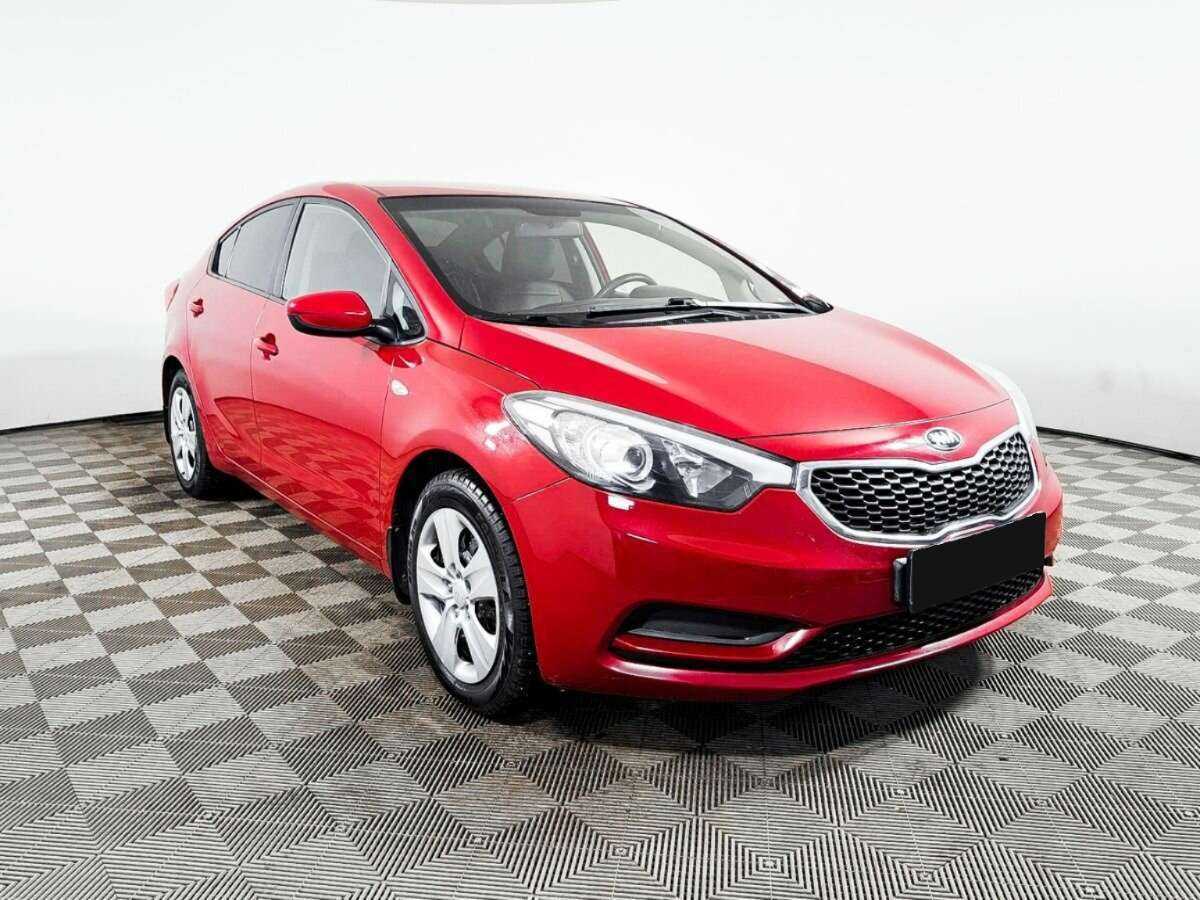 Kia Cerato с пробегом — 2013 год. Фото: #2
