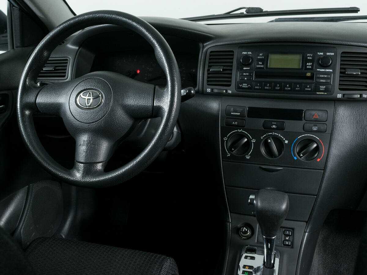 Toyota Corolla с пробегом — 2004 год. Фото: #8