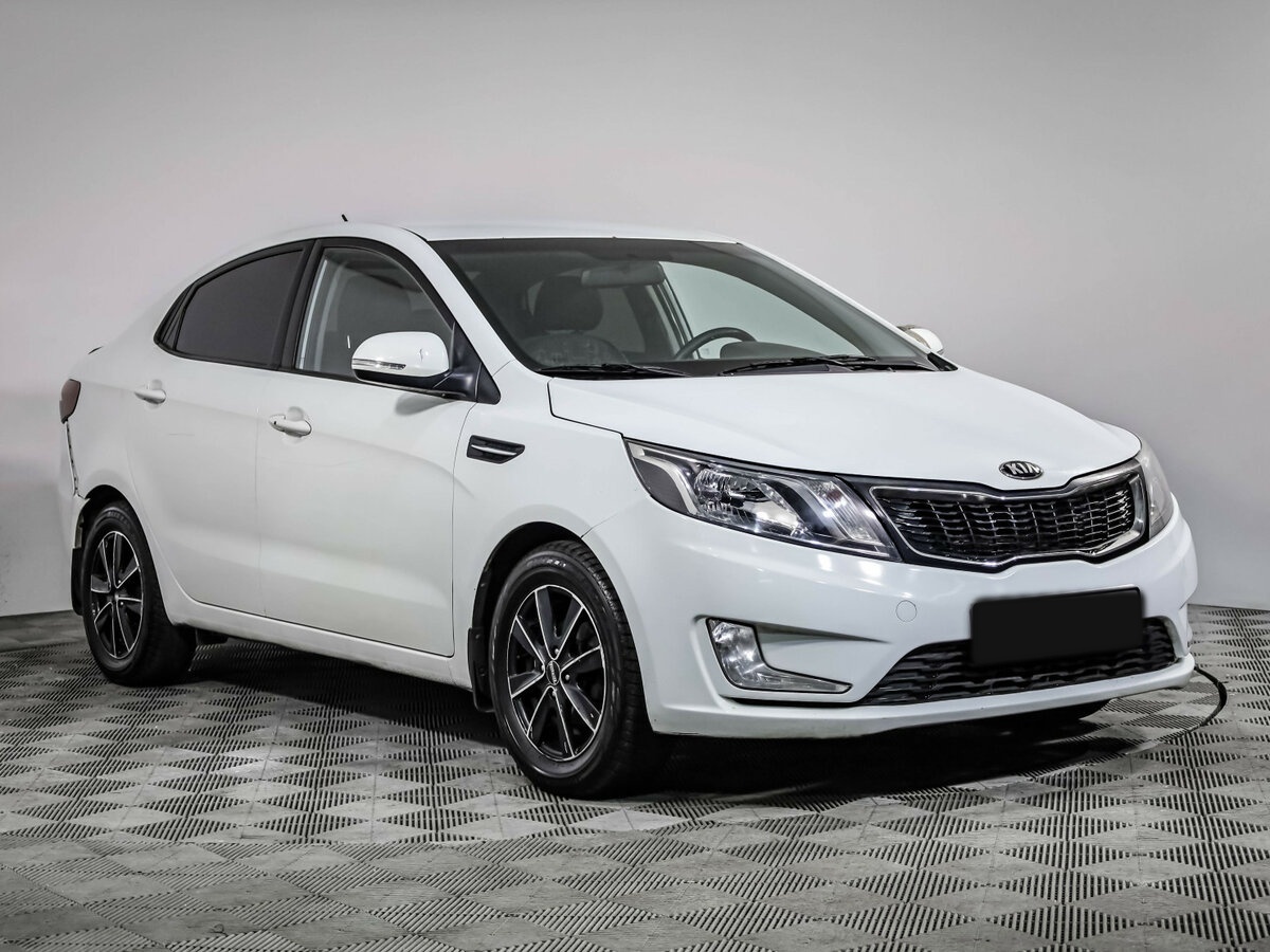 Kia Rio с пробегом — 2013 год. Фото: #2