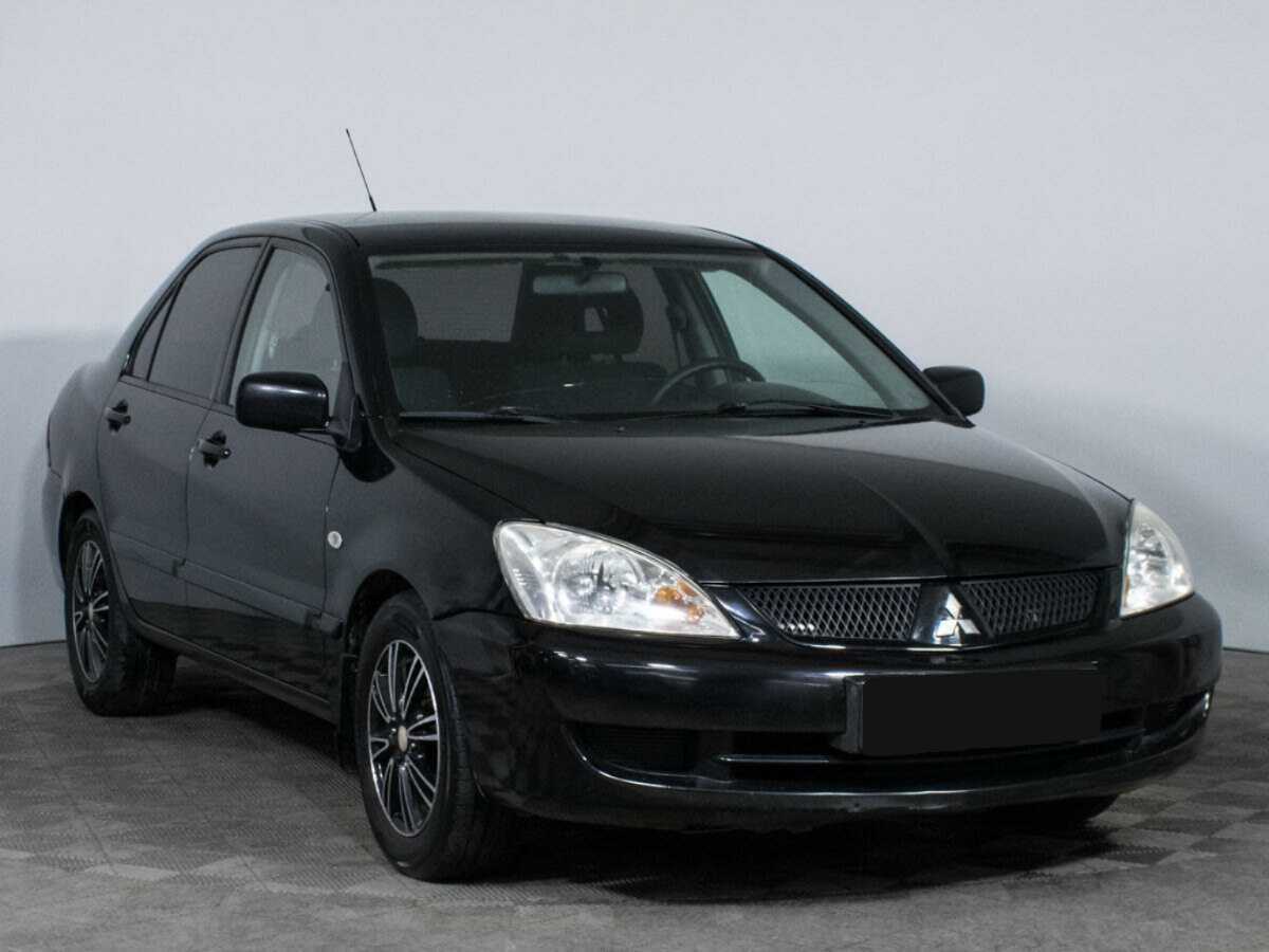 Mitsubishi Lancer с пробегом — 2009 год. Фото: #2