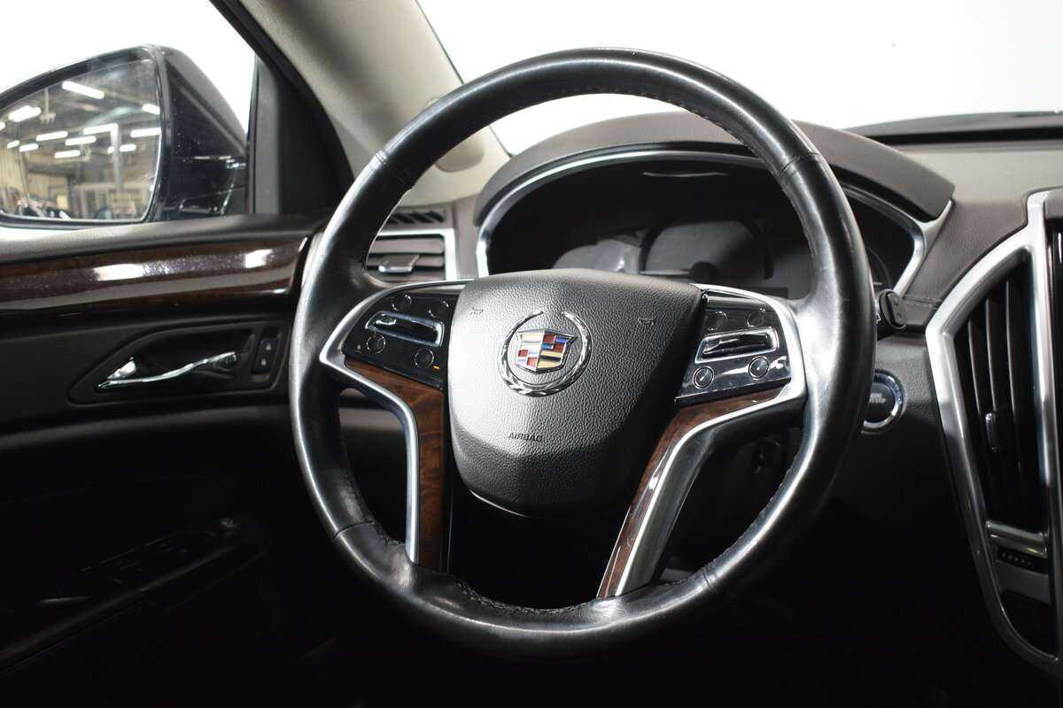Cadillac SRX с пробегом — 2013 год. Фото: #16