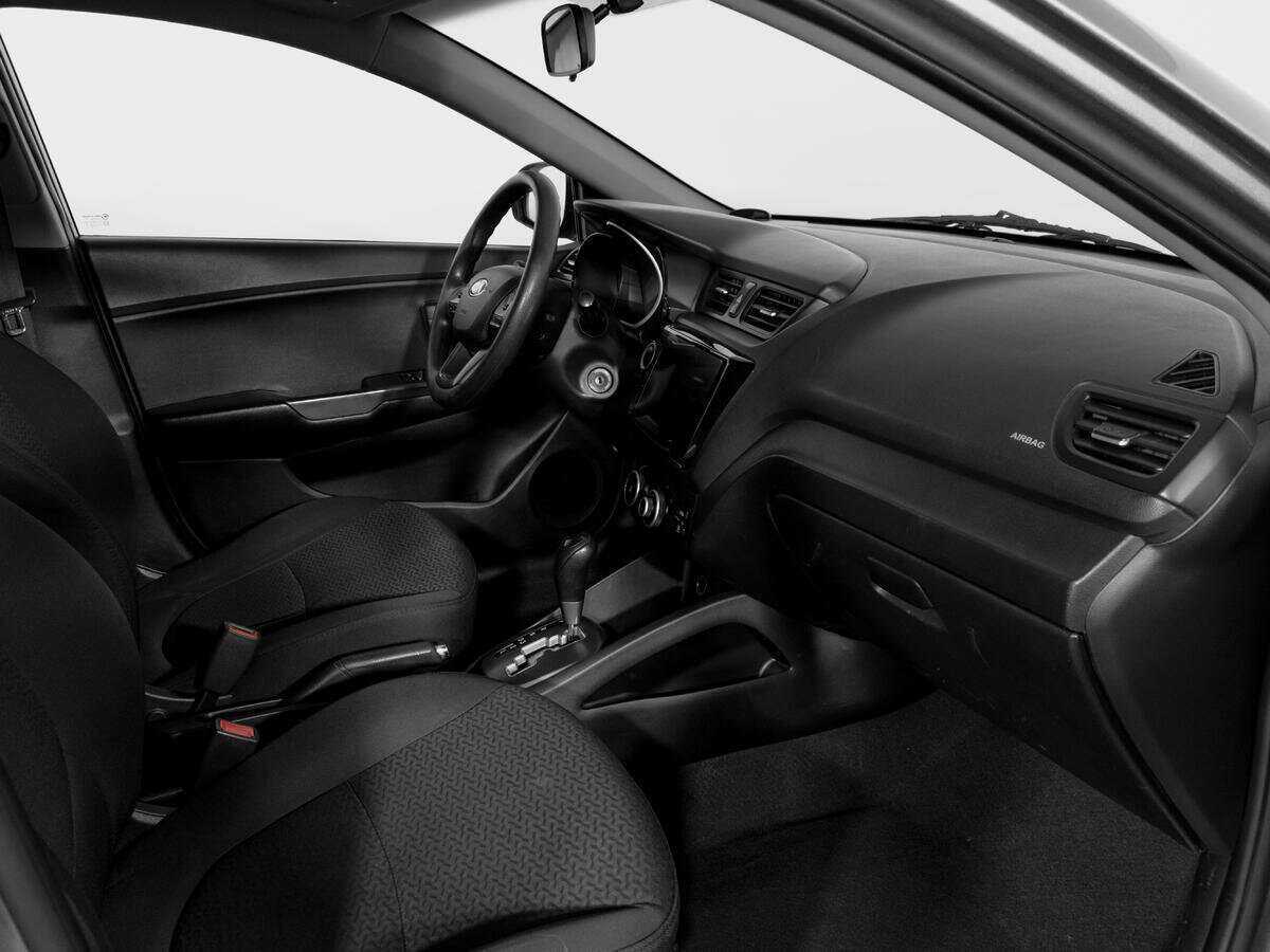 Kia Rio с пробегом — 2013 год. Фото: #8