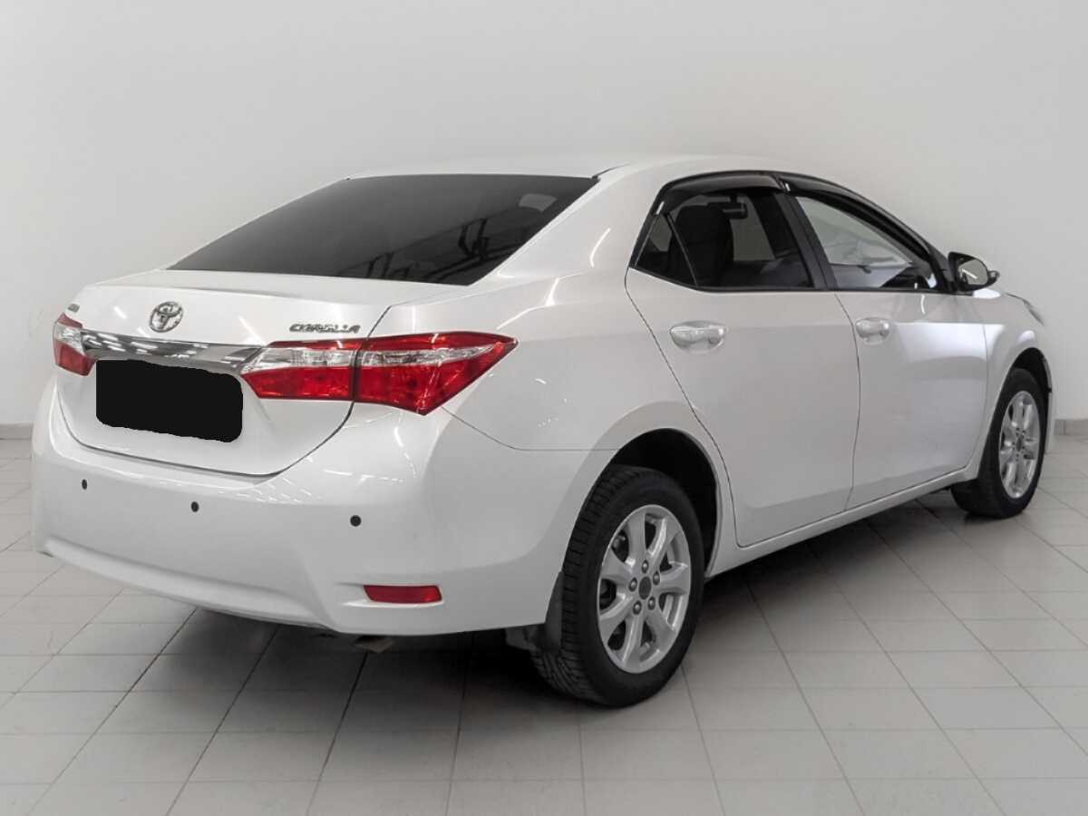 Toyota Corolla с пробегом — 2014 год. Фото: #4