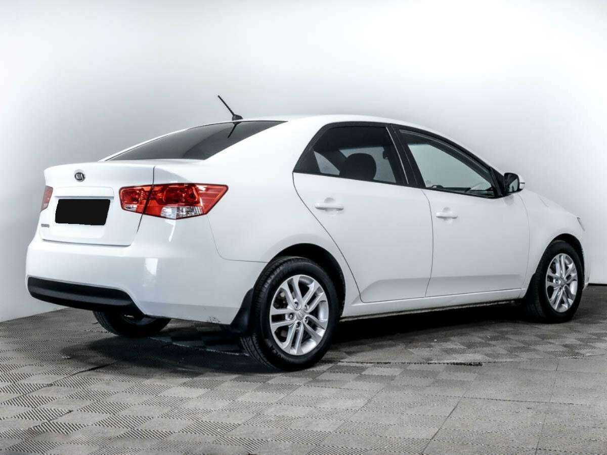 Kia Cerato с пробегом — 2011 год. Фото: #3