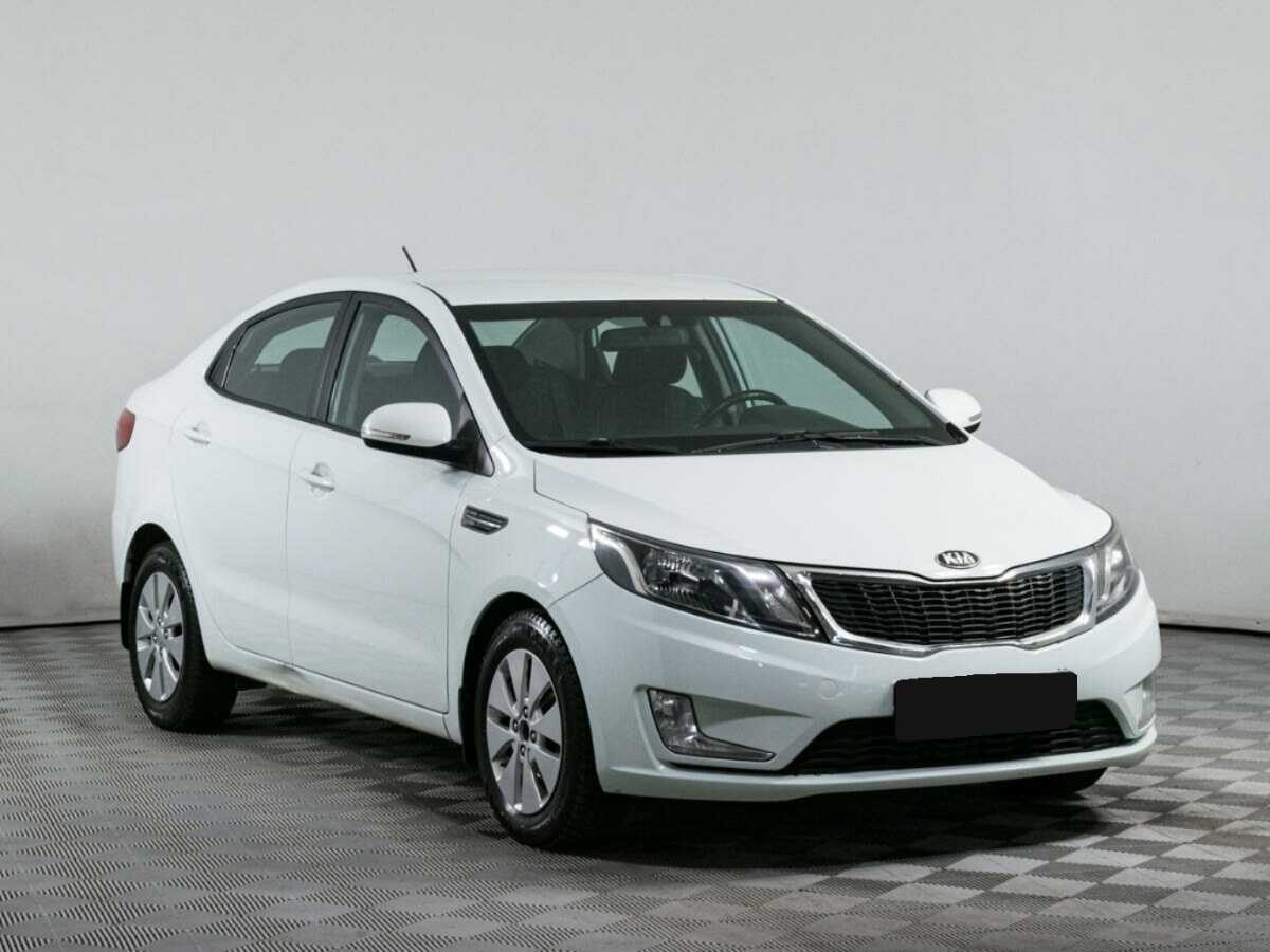 Kia Rio с пробегом — 2013 год. Фото: #2