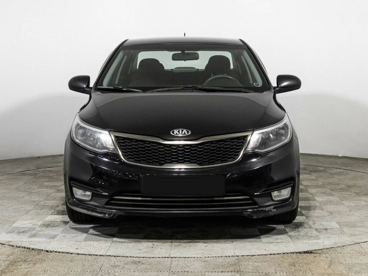 Kia Rio с пробегом — 2015 год. Фото: #1