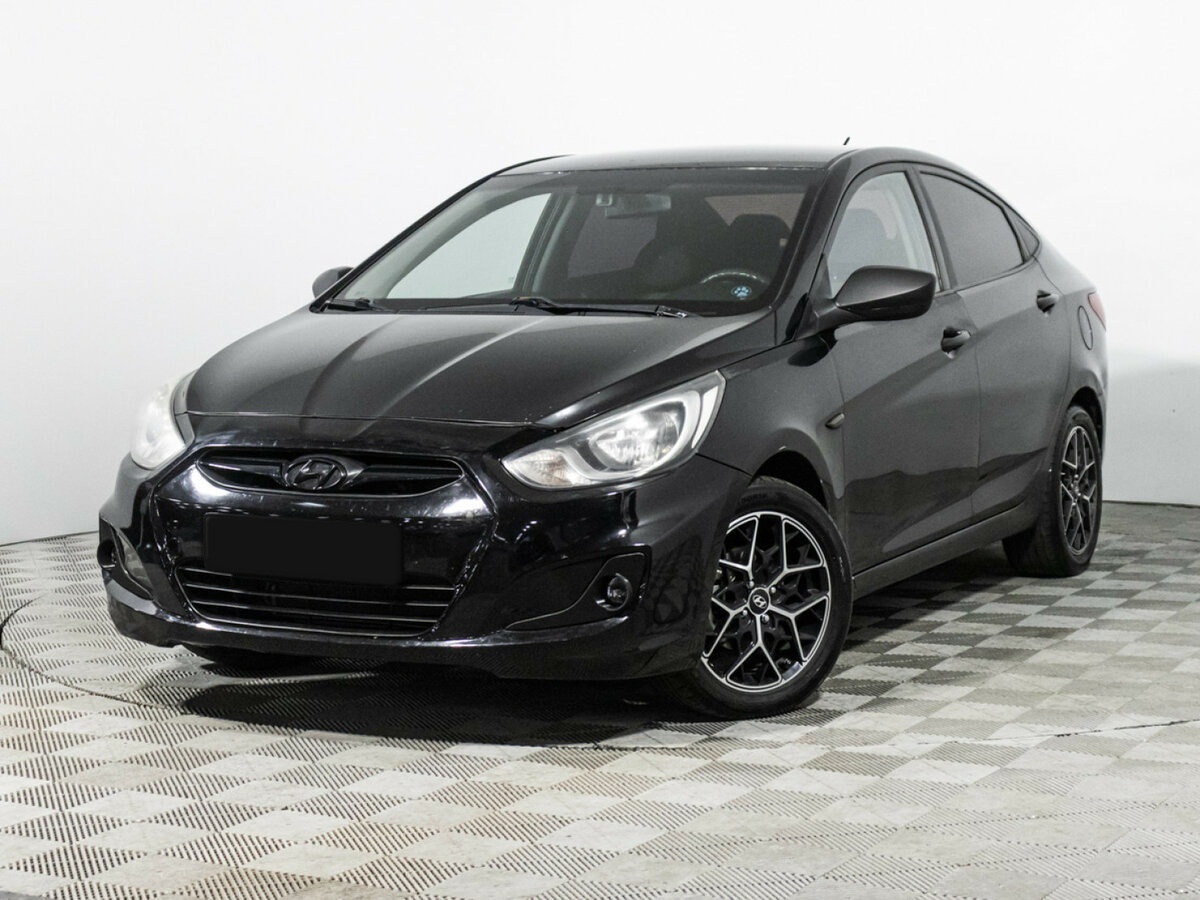 Hyundai Solaris с пробегом — 2011 год. Посмотреть фото