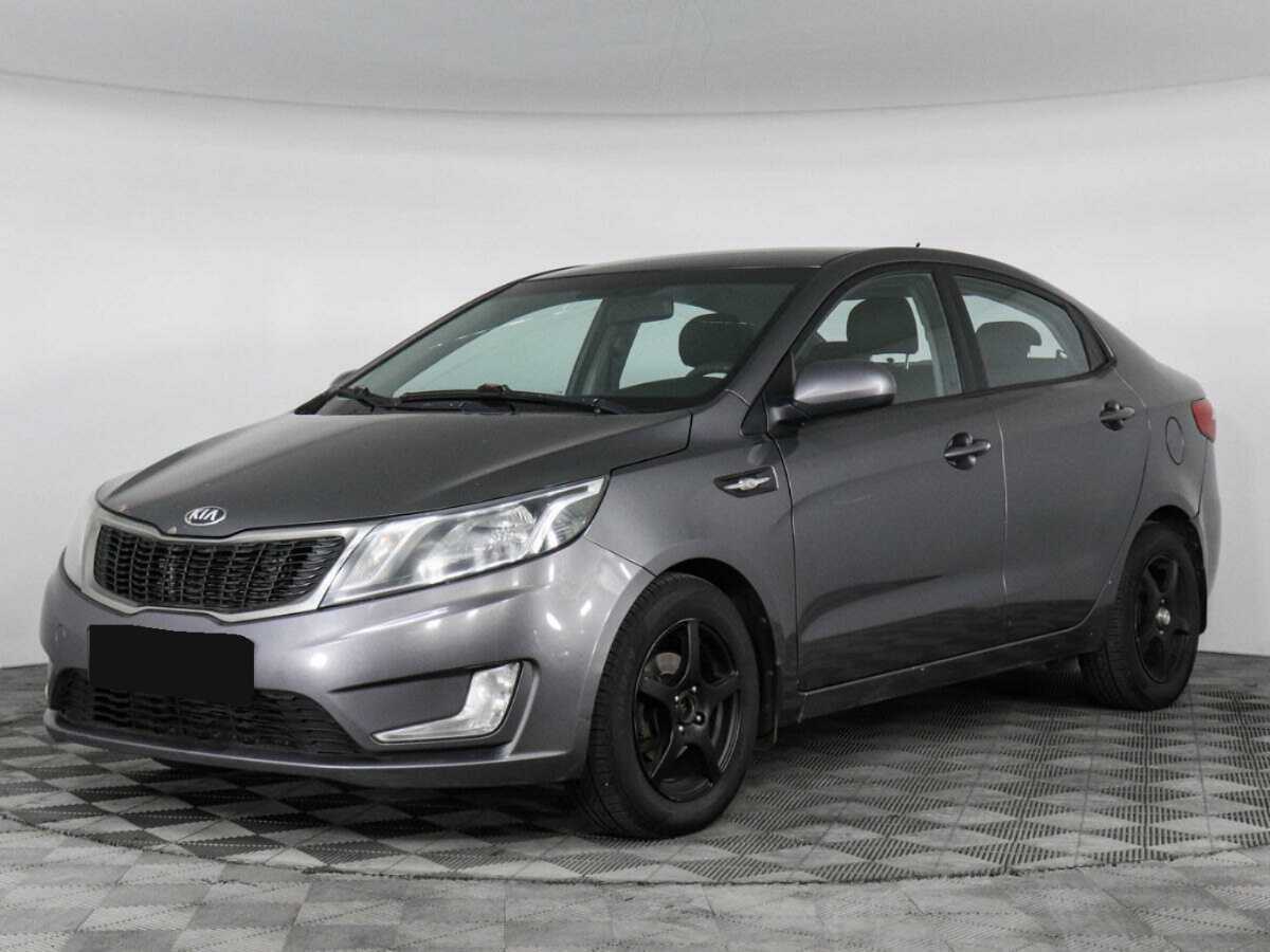 Kia Rio с пробегом — 2013 год. Фото: #0