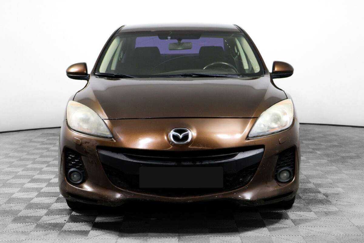 Mazda 3 с пробегом — 2013 год. Фото: #1
