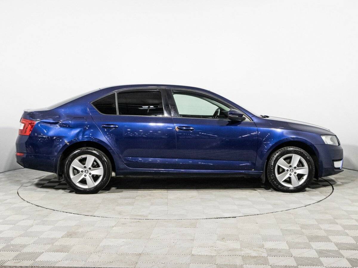 Skoda Octavia с пробегом — 2013 год. Фото: #3