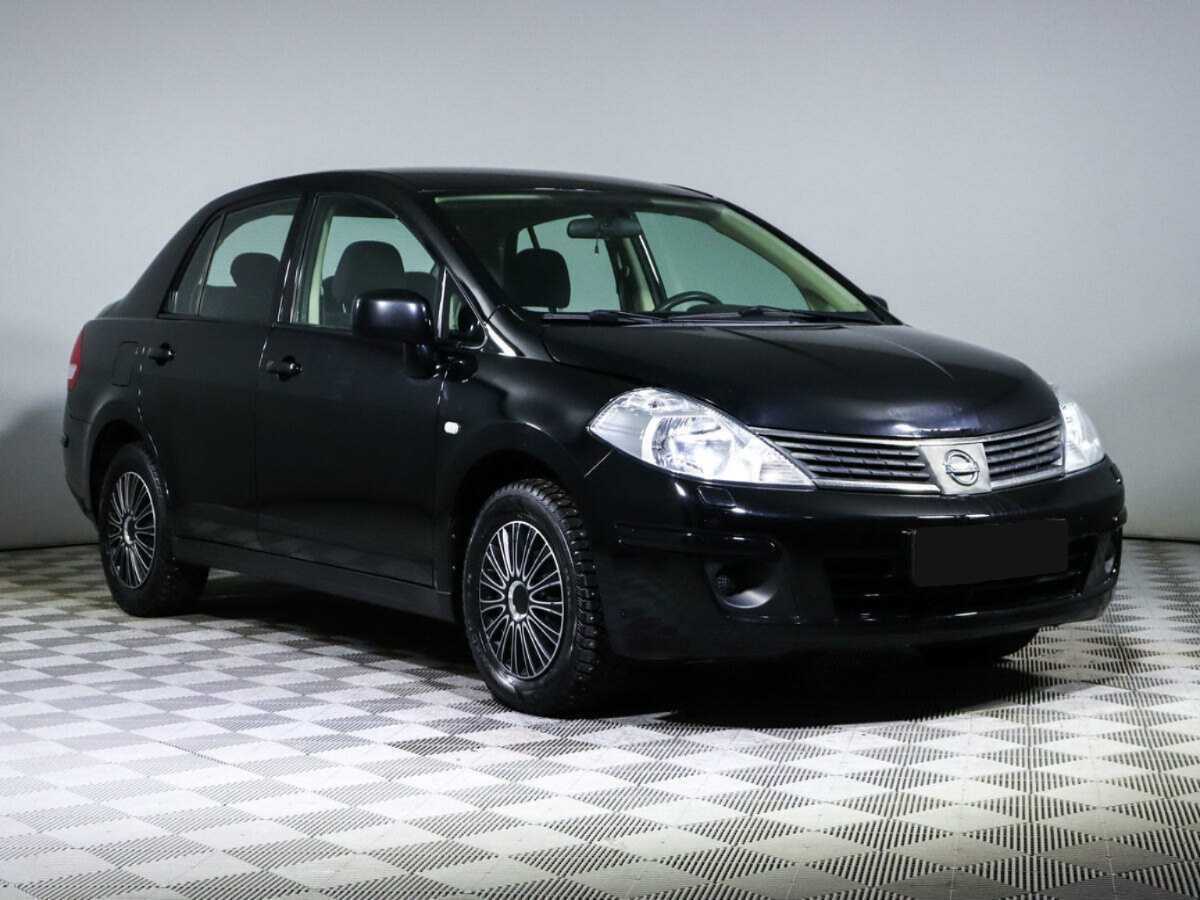 Nissan Tiida с пробегом — 2010 год. Фото: #2