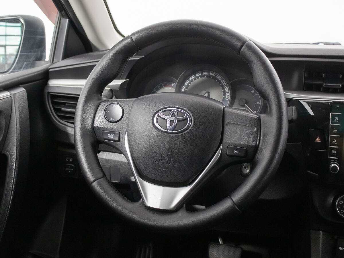 Toyota Corolla с пробегом — 2014 год. Фото: #14