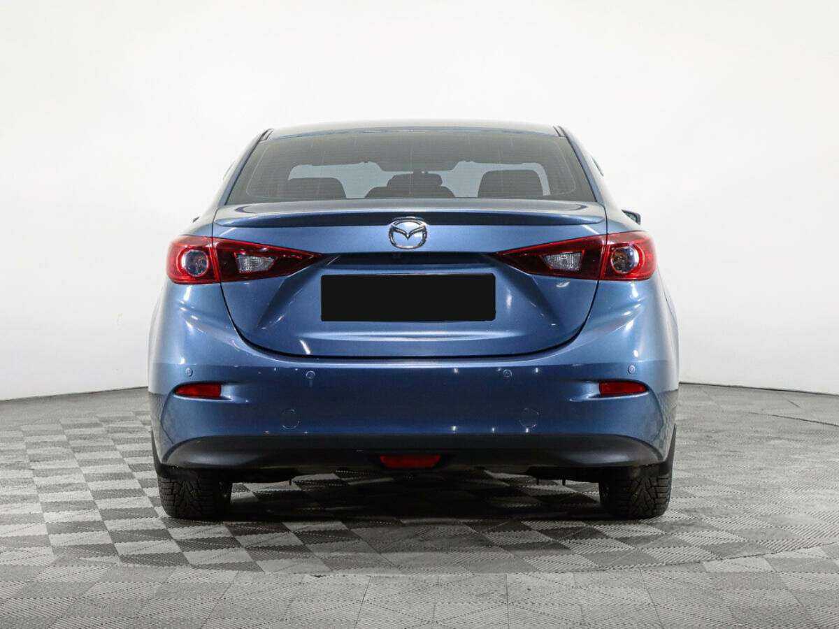 Mazda 3 с пробегом — 2013 год. Фото: #5