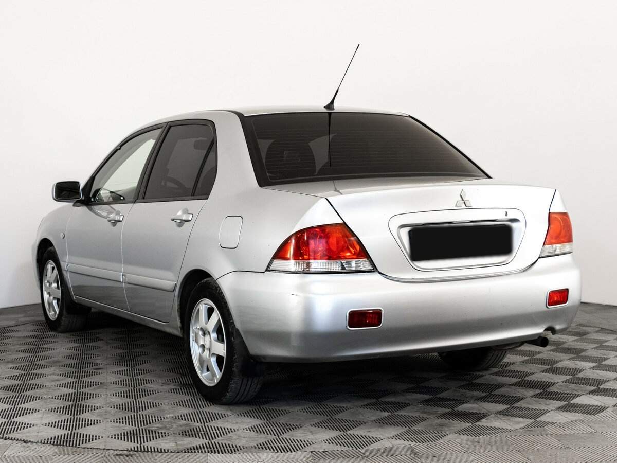 Mitsubishi Lancer с пробегом — 2006 год. Фото: #6