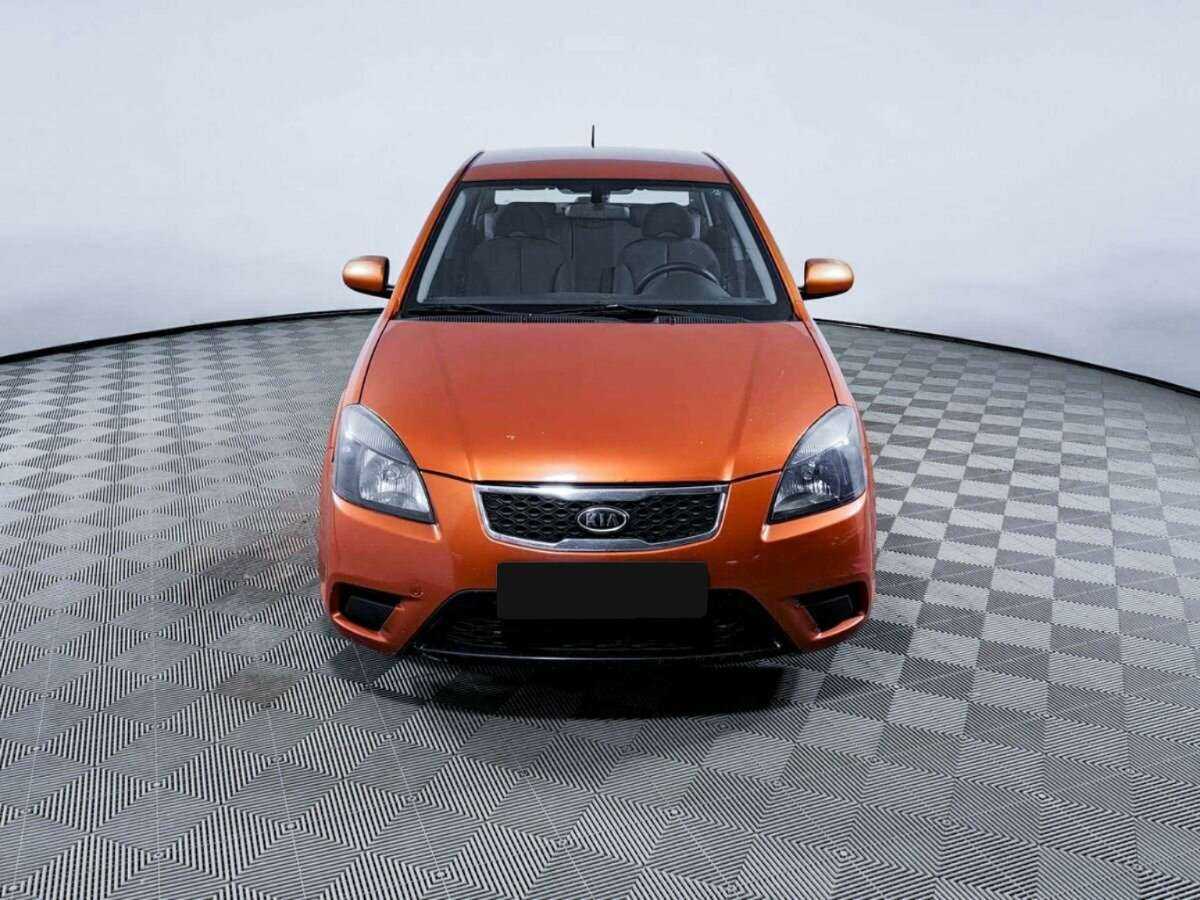 Kia Rio с пробегом — 2011 год. Фото: #1